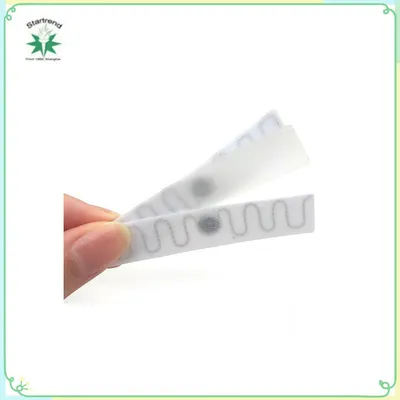 RFID Label Laundry Tag with Adhesive Backing Installed by Hot Pressing