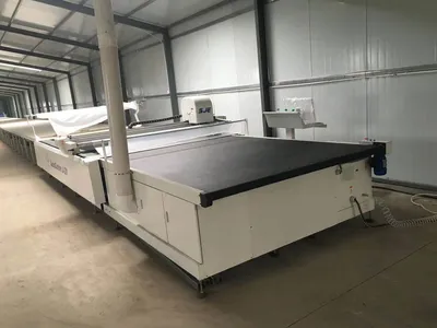 China Garment Automatic Cloth Cutting Machine Auto Knitting Cloth Cutting Machine Manufacturer