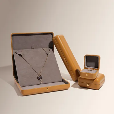 Rounded-Corner Leather Snap-Closure Jewelry Box for Rings, Pendants, and Bracelets