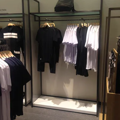 Minimalist Double Sided Metal Retail Clothing Display Rack for Boutiques
