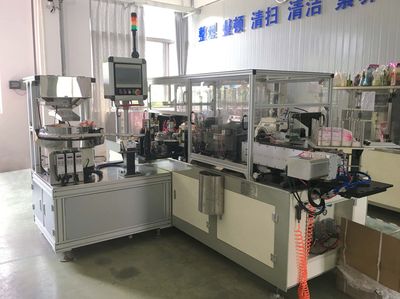 Automatic Pouch Spout Inserter