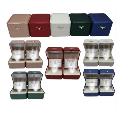 LED-Lit PU Leather Jewelry Box: Creative Qixi Festival and Wedding Ring Gift Box with Hanging Design