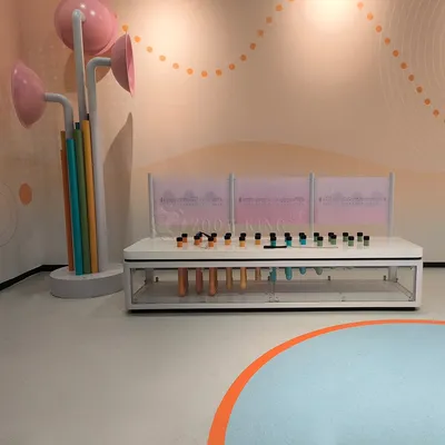 Science Museum Visitors Learn About Charm of Music with Pipeline Music Interactive Exhibit Pipe Instrument Device Model Musical Exhibits