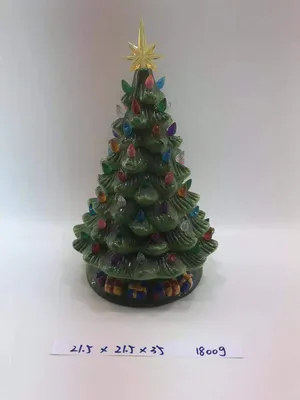 Large Gifts Around Light Christmas Tree