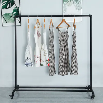 Stylish Black Metal Clothing Rack on Wheels for Easy Mobility