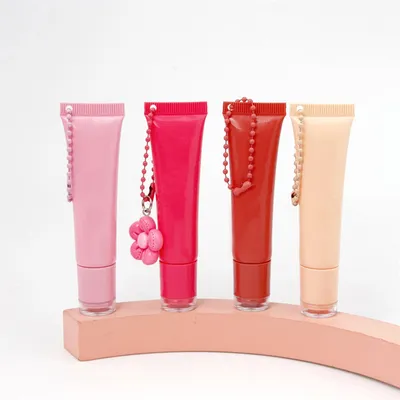 Wholesale 15ml Keychain Squeeze Lip Balm Tubes Empty Soft Plastic Packaging Custom Logo Lip Oil Lip Gloss Tube Plastic Applicator