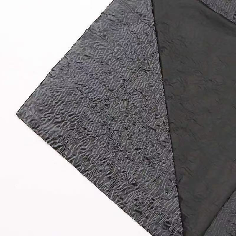 Self-adhesive crack patch for road surface crack repair