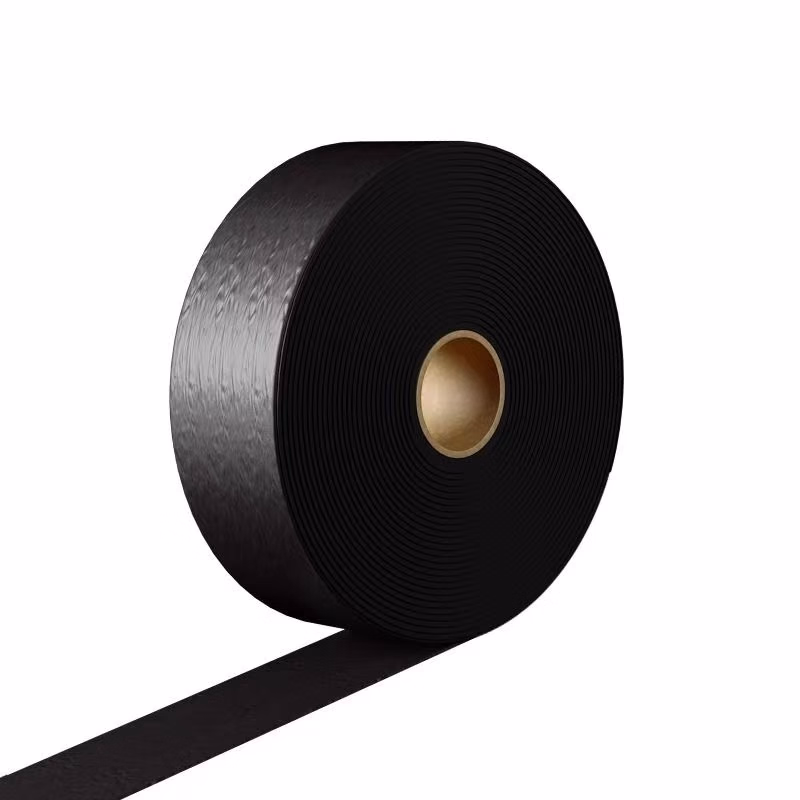 Repair of cracks in new and old road surfaces with adhesive sealing strips